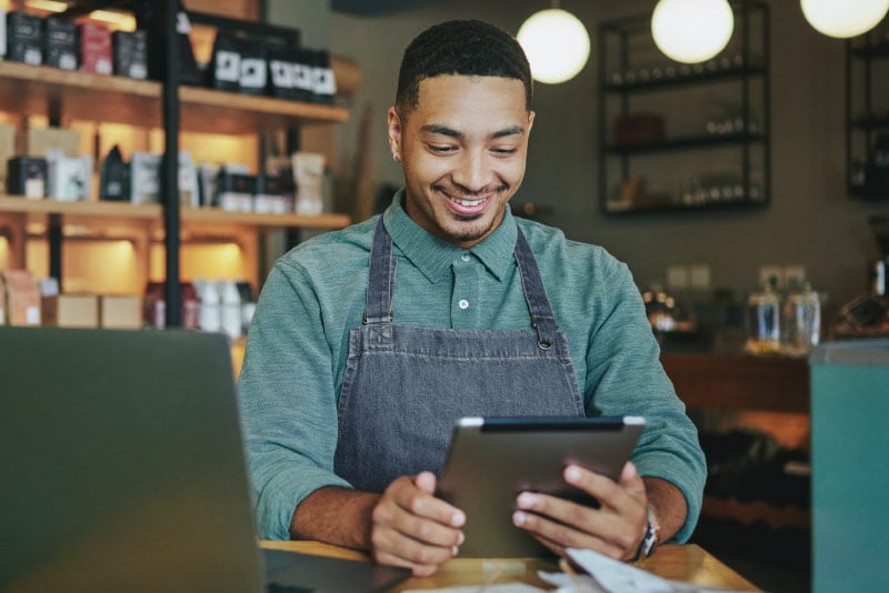 A small business owner reviewing the digital banking solution