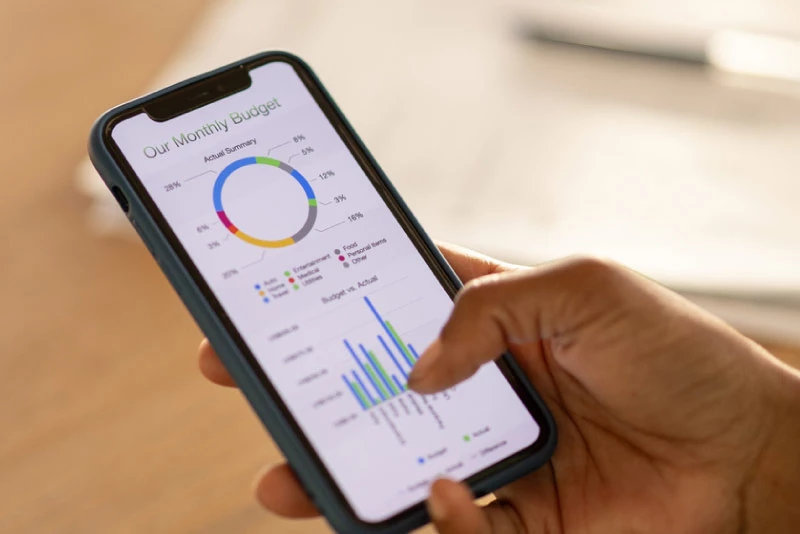 A personal looking at information on his mobile device